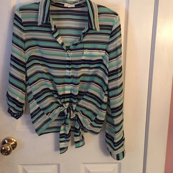 A stripe long sleeved button done collared blouse.