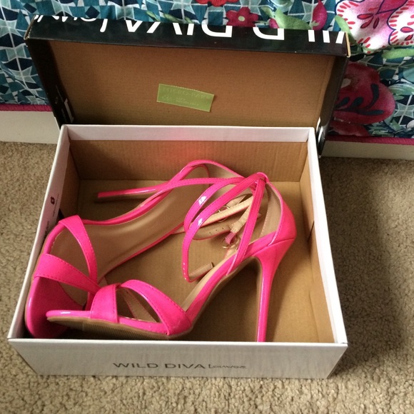 Neon pink strappy heels