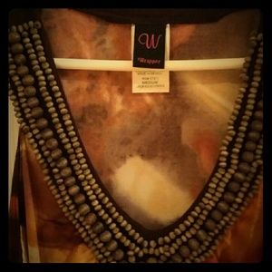 Tank top with wood bead details.