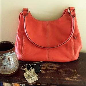 Tignanello Pumpkin colored Leather handbag