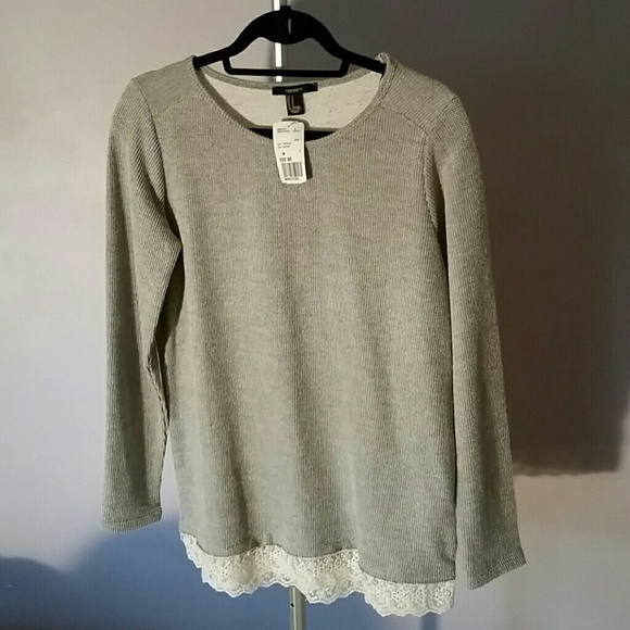 Oversized gray sweater with lace bottom