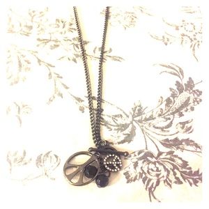 Black and silver peace necklace