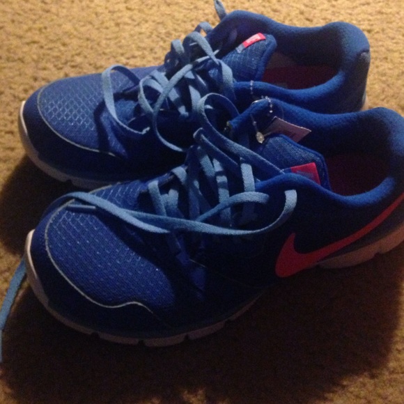 Blue nikes pink swoosh