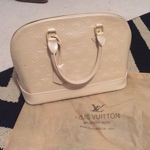 Beige l v alma purse