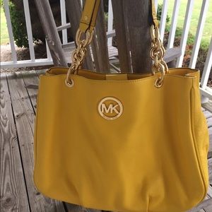 Yellow used Michael Kors large Fulton