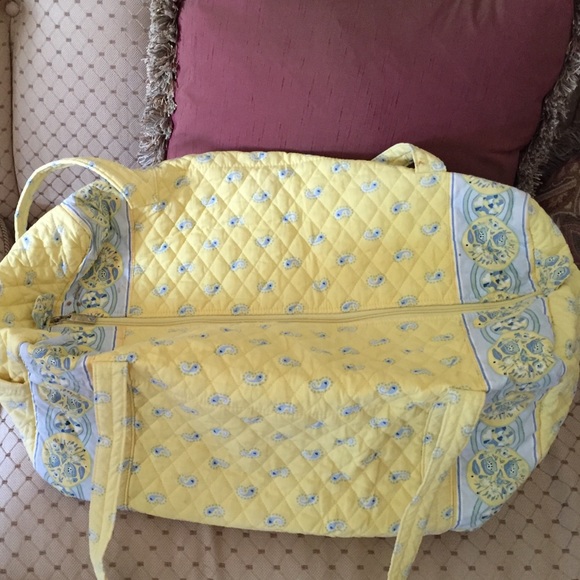 Yellow print duffle quilted bag.