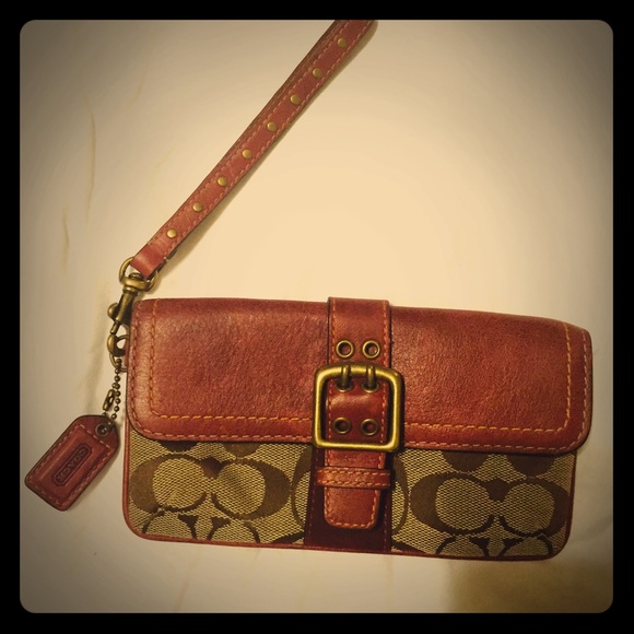 Coach wristlet, burgundy and Coach print