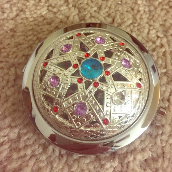 Adorable little portable mirror!