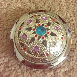 Adorable little portable mirror!