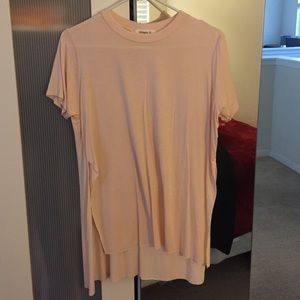 Pale pink shirt with slits