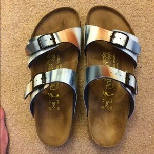Blue, white, and orange Birkenstock sandals