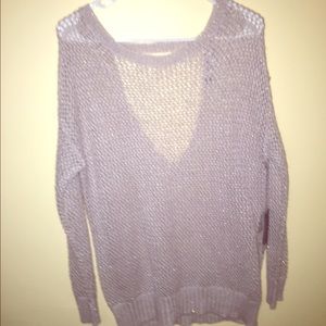 Jennifer Lopez longline sweater