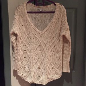 White knit v-neck sweater.