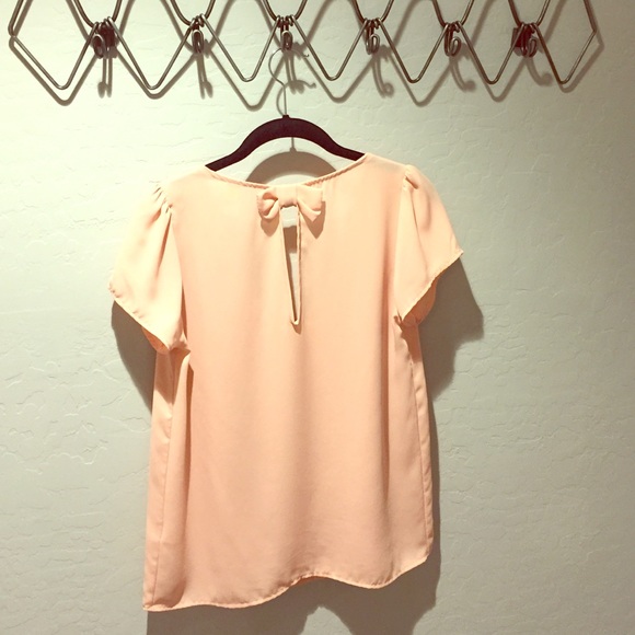 100% polyester peach scoop top