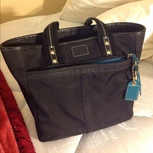 Authentic black Coach bag with turquoise interior