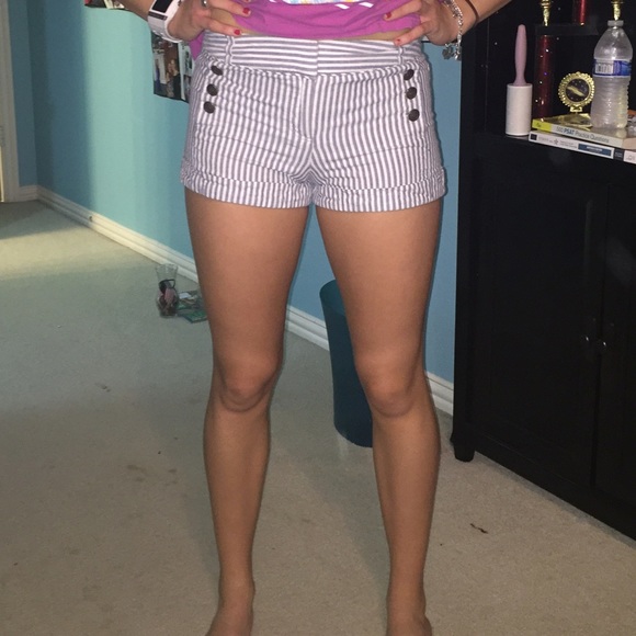 striped shorts.