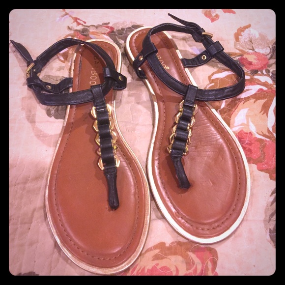 Black and gold hard wear sandals