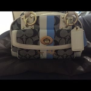 Coach handbag     Measures: 9.5 x 4.5 x 6 in.