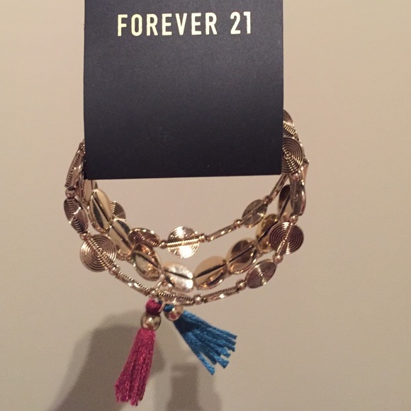 Gold bracelets with tassel