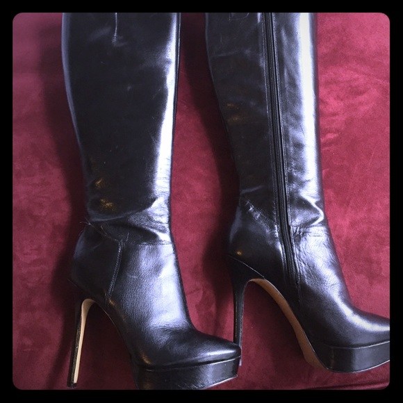 Tall leather heeled boots