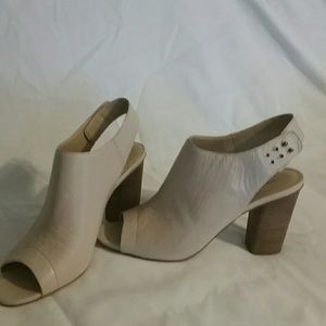 Slip on nude with adjustable straps worn once