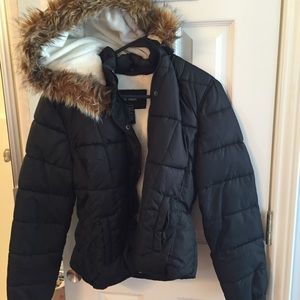 Black puffer jacket with fur lined hood