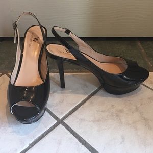 Black patent peep toe pumps