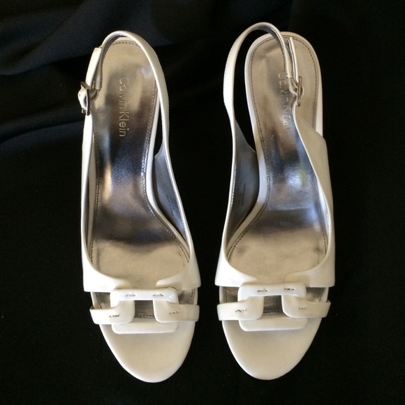 Calvin Klein size 7 white Patent like new