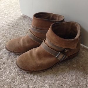 Brown suede booties with stacked heel and buckles