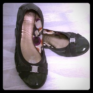 Coach gray patent leather flats.