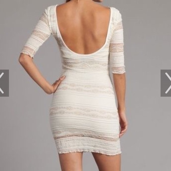 Cream color 3 quarter sleeve scoop back mini dress