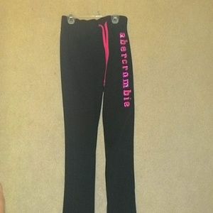 Black sweat pants witg pink sparkly writing