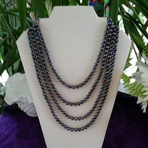 85 " Black / peacock pearl  necklace.
