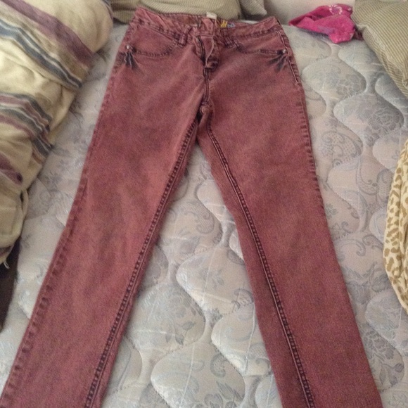 Red acid skinny jeans