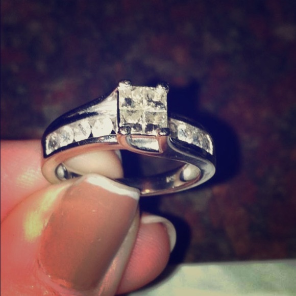 14k white gold princess cut diamond ring.