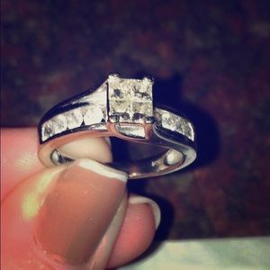 14k white gold princess cut diamond ring.