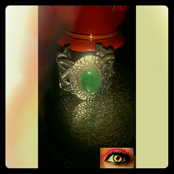 Silver Tone Bracelet with Green Assimilated Stone