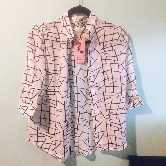 Never-worn black and white detail blouse