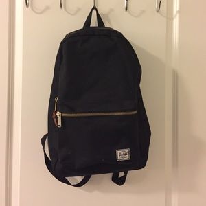 Herschel black backpack with gold zipper