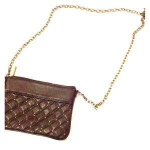Clutch with gold chain strap