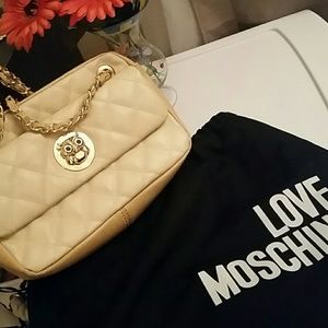 Authentic Moschino purse with gold chain handles