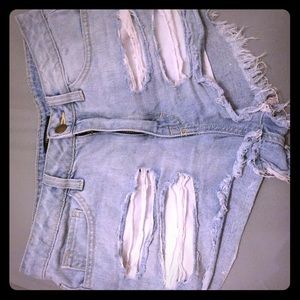 High waisted distressed denim