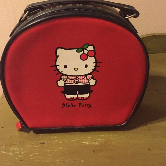 A box purse with hello Kitty on it