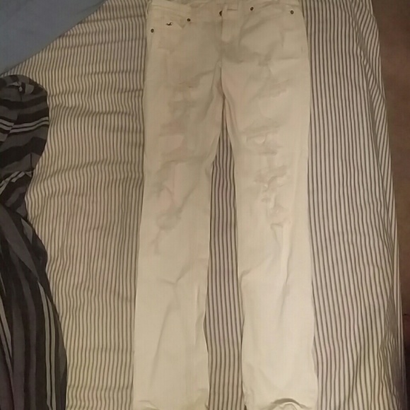 White ripped pants
