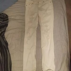 White ripped pants