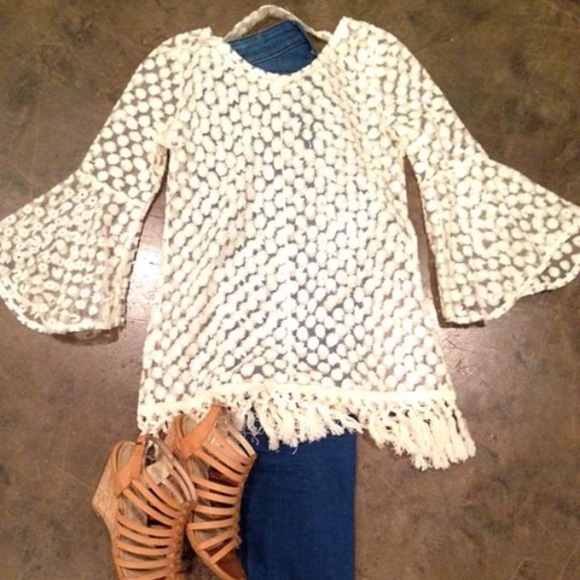 A-freaking-dorable bell sleeve top with fringe!