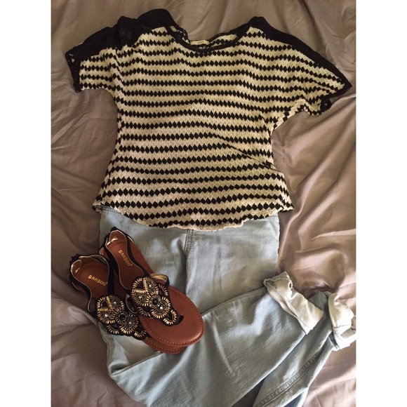 Diamond pattern shirt.