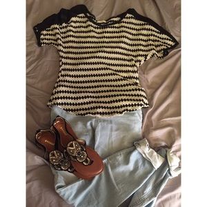 Diamond pattern shirt.