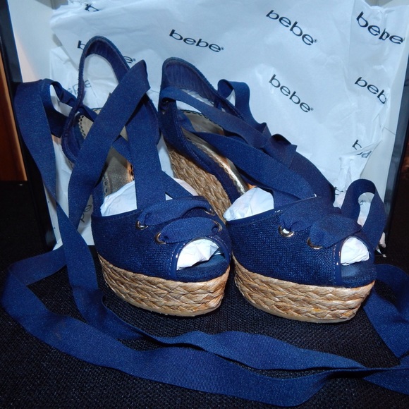 Blue lace up wedges by Bebe
