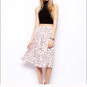 ASOS Pink midi skirt with pockets.